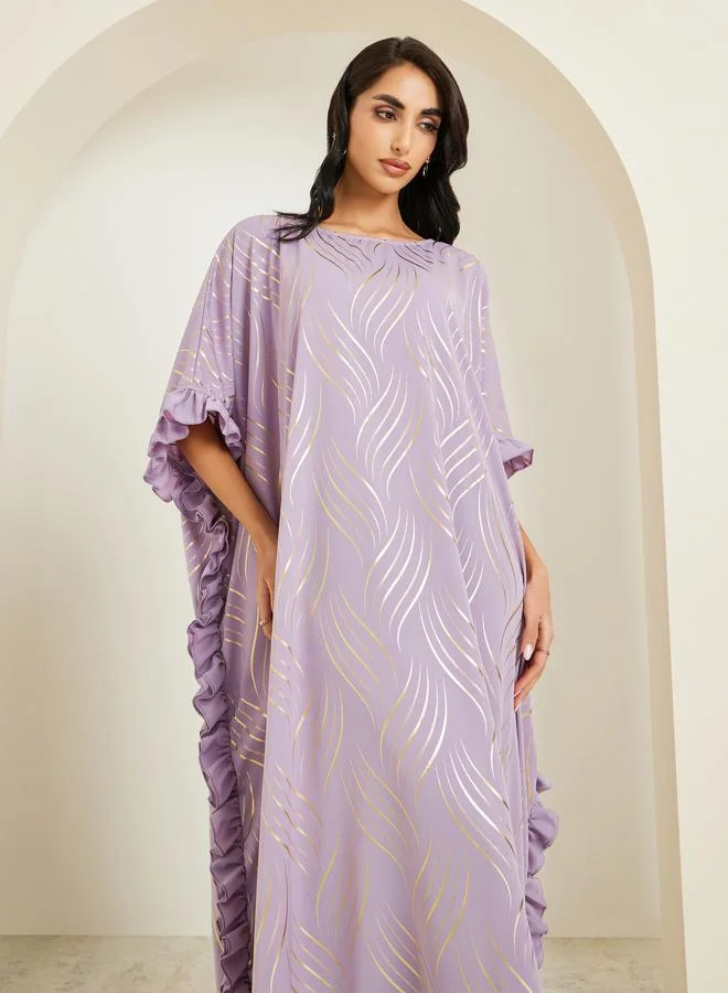 أميرة قفطان طويل بطبعة ذهبية